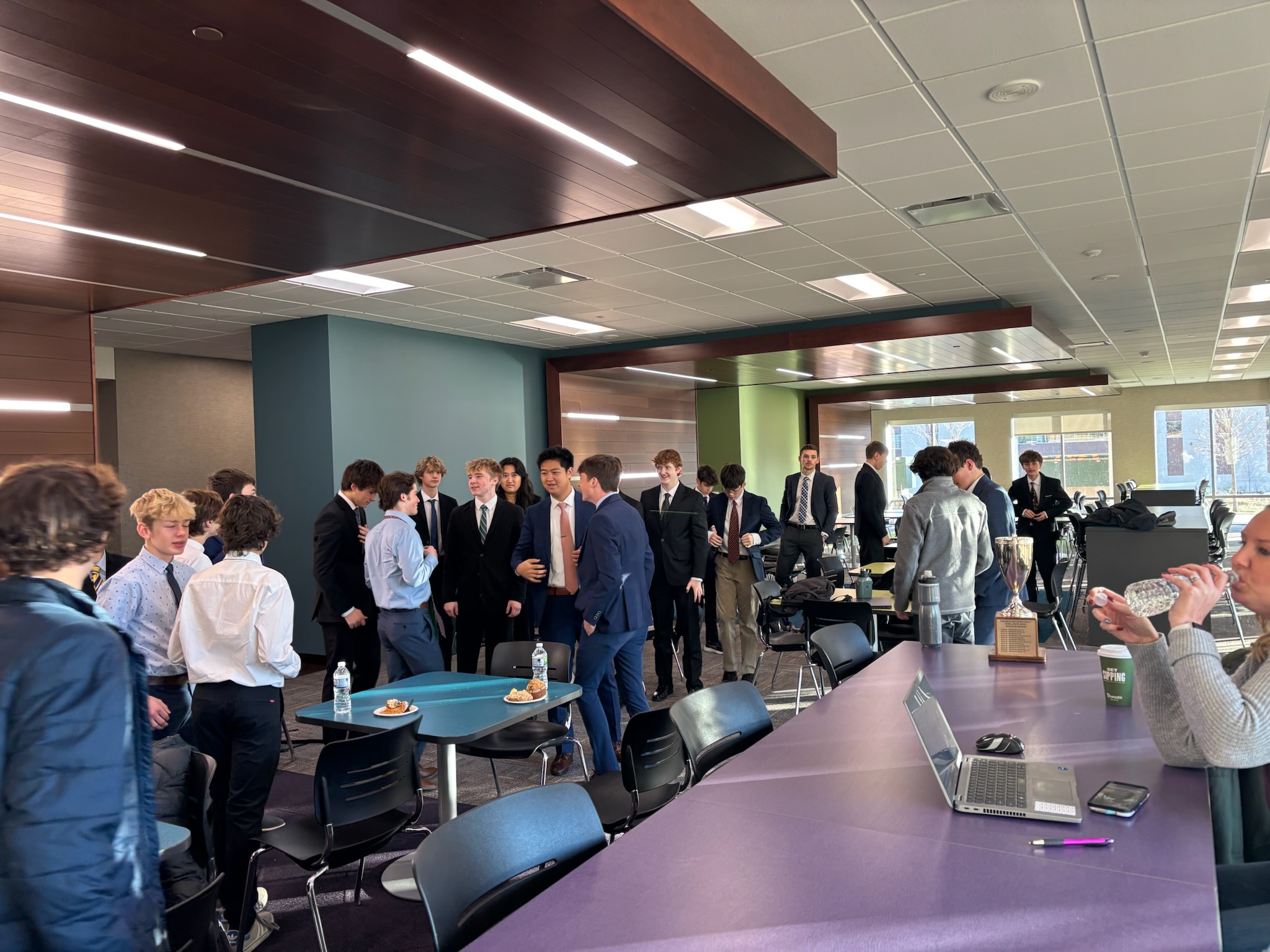 Students in professional meeting setting